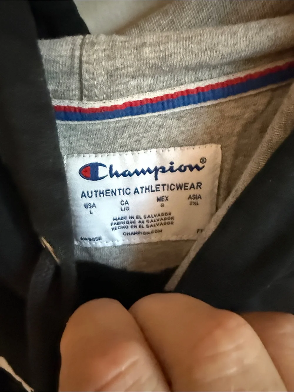 Champion Black Hoodie with Script Logo and Red Accent
